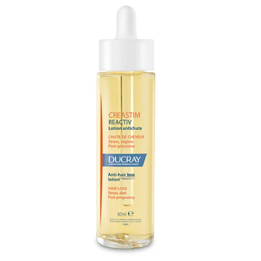 Loción capilar anticaída Ducray Creastim para el tratamiento de la pérdida de cabello por estrés o postparto. Formato de 60ml.