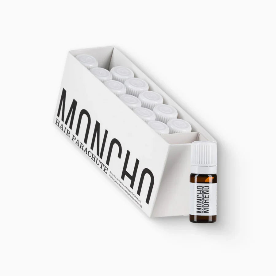 Caja de 12 ampollas de 6 ml de Moncho Moreno Hair Parachute, tratamiento capilar bifásico para combatir la caída y estimular el crecimiento saludable.
