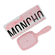 Cepillo desenredante Moncho Moreno Magic Unraveller en color rosa, diseñado para cabello mojado y rizado con acción antiestática.
