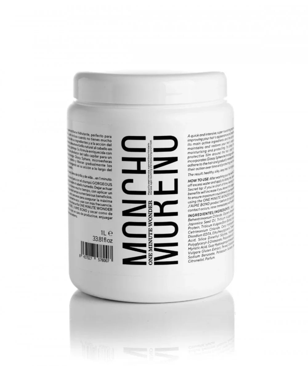 Envase de 1L de mascarilla capilar reparadora con proteínas de trigo y tecnología de microesferas para proteger el brillo y el color del cabello.