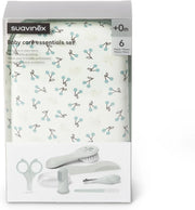 Set de manicura Suavinex verde con peine, cepillo, tijeritas, cortauñas, lima y cepillo dental.