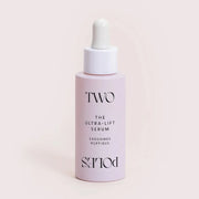 Frasco de 30 ml de Two Poles The Ultra Lift Serum tratamiento antiedad reafirmante con exosomas y péptidos para corregir arrugas y manchas.